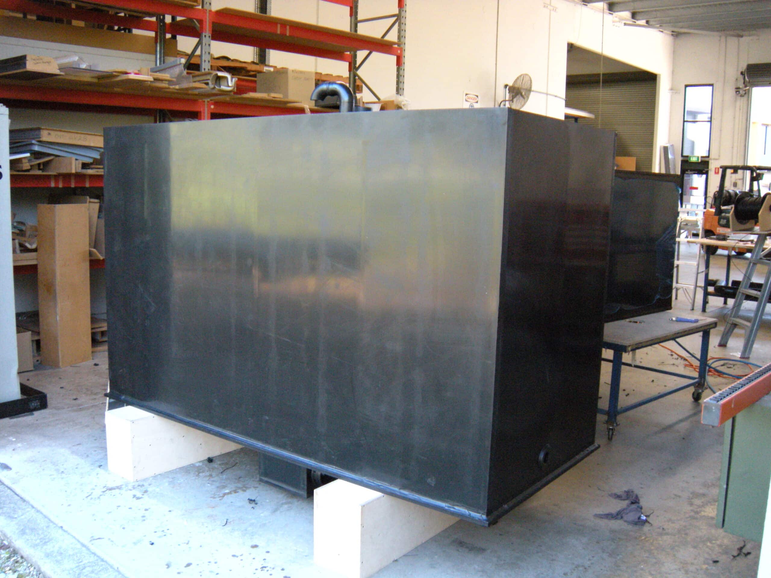 Custom HDPE water tanks fabricated by P&M Plastics for fire truck applications